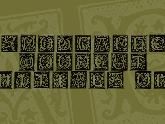 Typographer Woodcut Initials One font